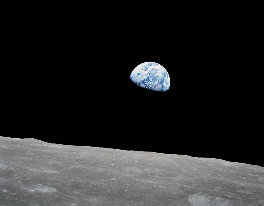 Apollo 8's Earthrise photo with the earth appearing over the horizon of the Moon Apollo 8's Earthrise photo with the earth appearing over the horizon of the Moon